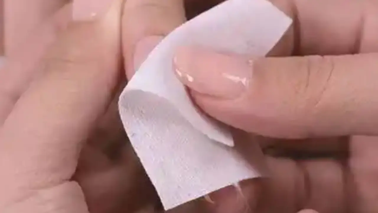 Gently Scrubbing And Removing The Gel Polish