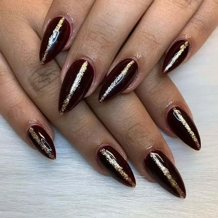 Maroon & Gold Stiletto Shaped Nails