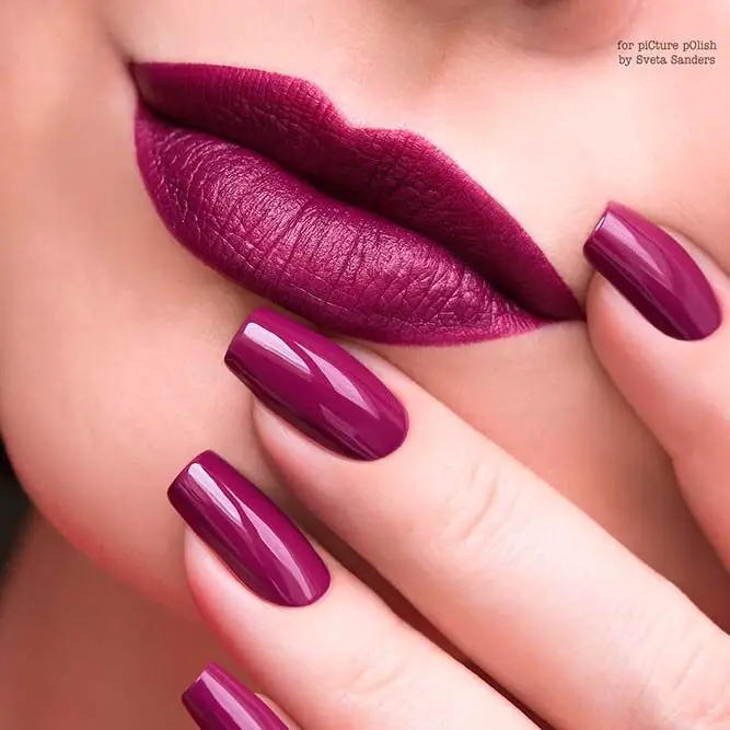 Matching Plum Lipstick And Nail Polish