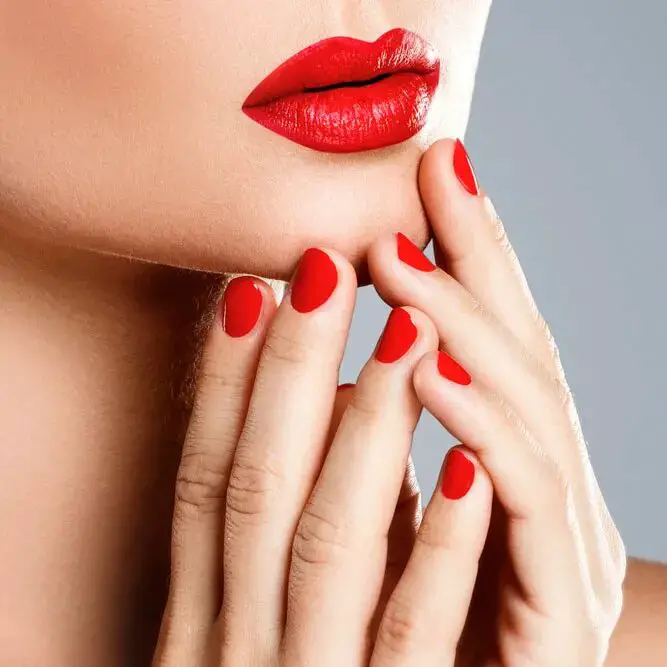 Matching Red Lipstick And Nail Polish