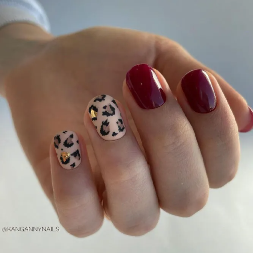 Maroon-Nails-with-Foil-Designs-1