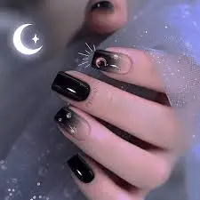 Matte-Black-Nails-with-Metallic-Stars-5.jpg