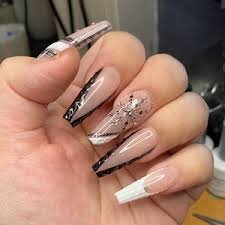 Stiletto-Matte-Nude-Nails-with-Black-Dots-9
