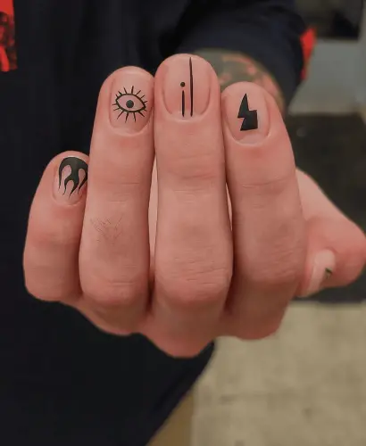 Tattoo-Inspired-Matte-Black-Nails-1.jpg