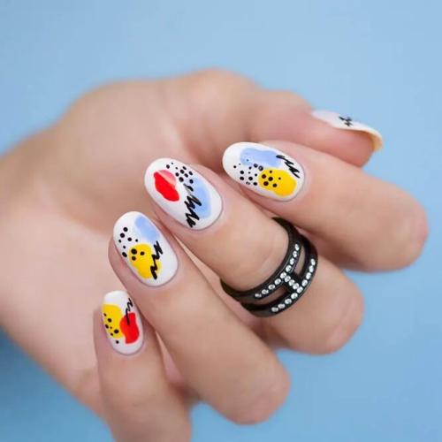 White-Nail-Polish-with-Bright-Pops-of-Color-1