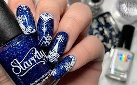 blue-glitter-snowflake-nail-idea-6